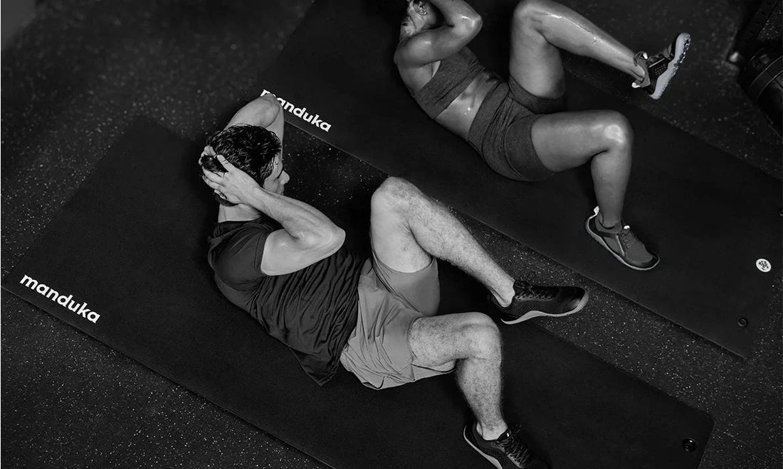 A male and a female athlete training on a P/ROX Hybrid Fitness Mat | Manduka New Zealand