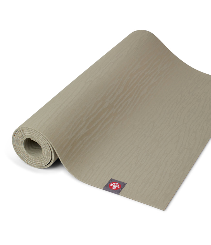 Manduka eKOLite 4mm Yoga Mat - Rock - part rolled | Manduka NZ