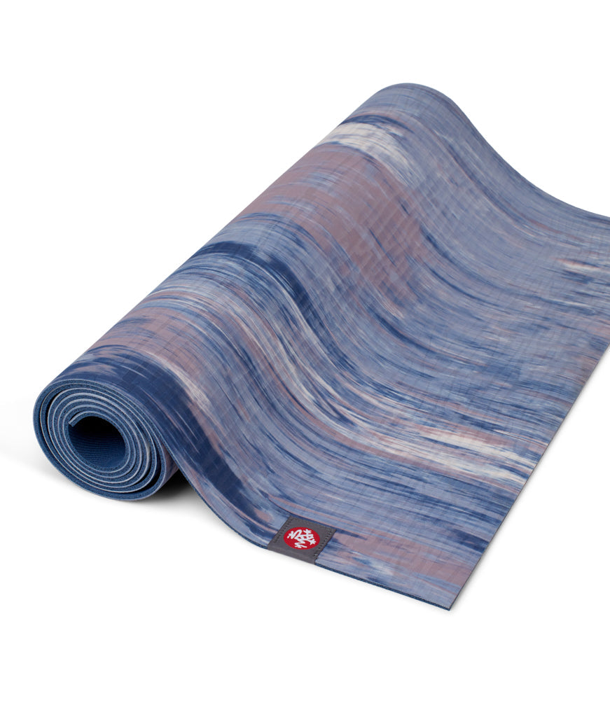 Manduka eKOLite 4mm Yoga Mat - Odyssey Marbled - part rolled | Manduka NZ