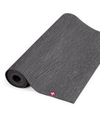 Manduka eKOLite 5mm Yoga Mat - Charcoal - part rolled | Manduka NZ