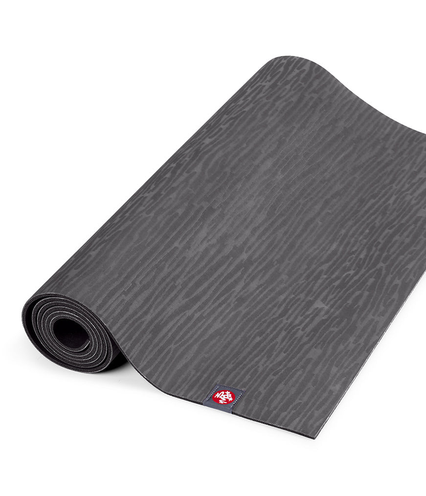 Manduka eKOLite 5mm Yoga Mat - Charcoal - part rolled | Manduka NZ