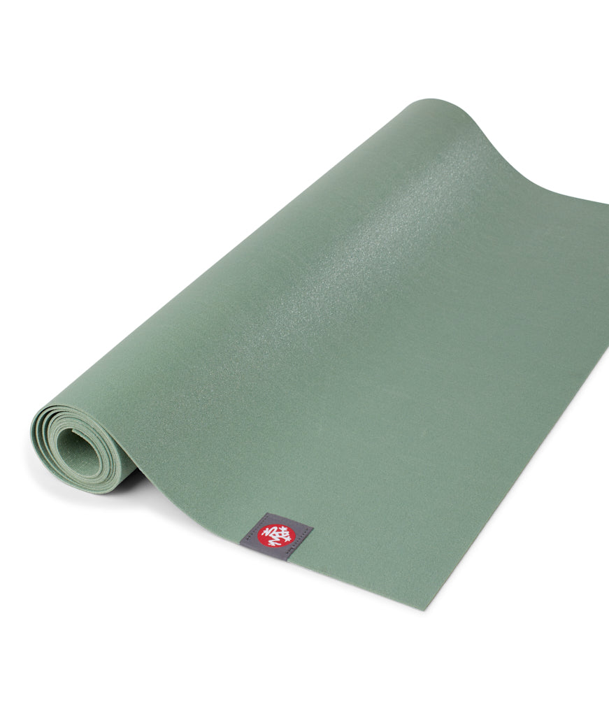 Manduka eKO Superlite 1.5mm Yoga Mat - Leaf Green - part rolled | Manduka NZ
