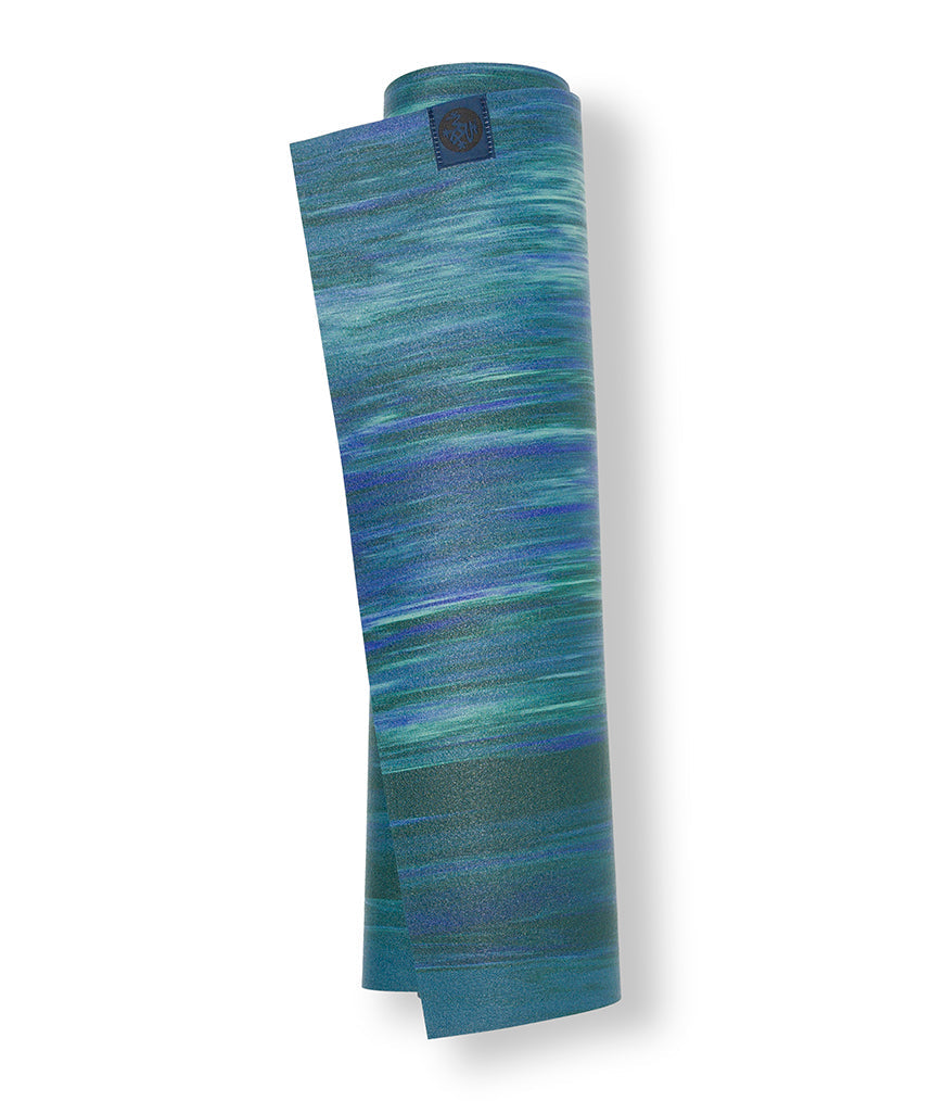 Manduka eKO Superlite 1.5mm Yoga Mat - Toad Marble  - rolled vertical | Manduka NZ