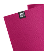 Manduka X 5mm Yoga Mat - Dark Pink - Corner of mat with logo | Manduka NZ