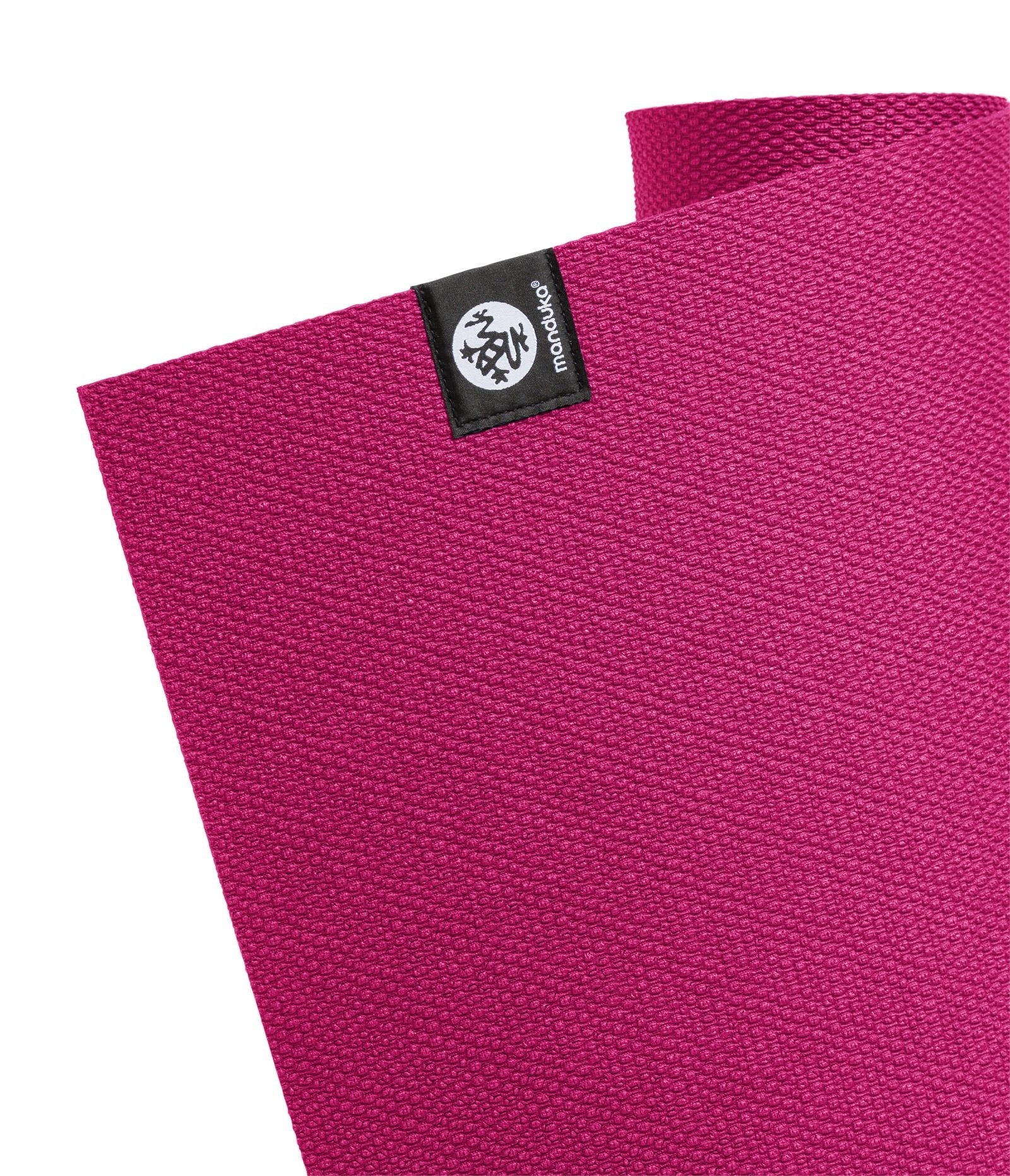 Manduka X 5mm Yoga Mat - Dark Pink - Corner of mat with logo | Manduka NZ