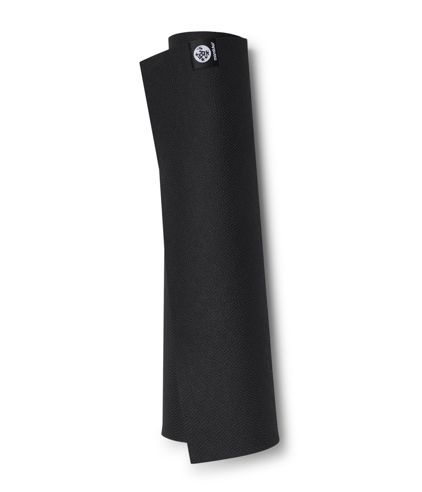 Manduka X 5mm Yoga Mat - Black - Rolled | Manduka NZ