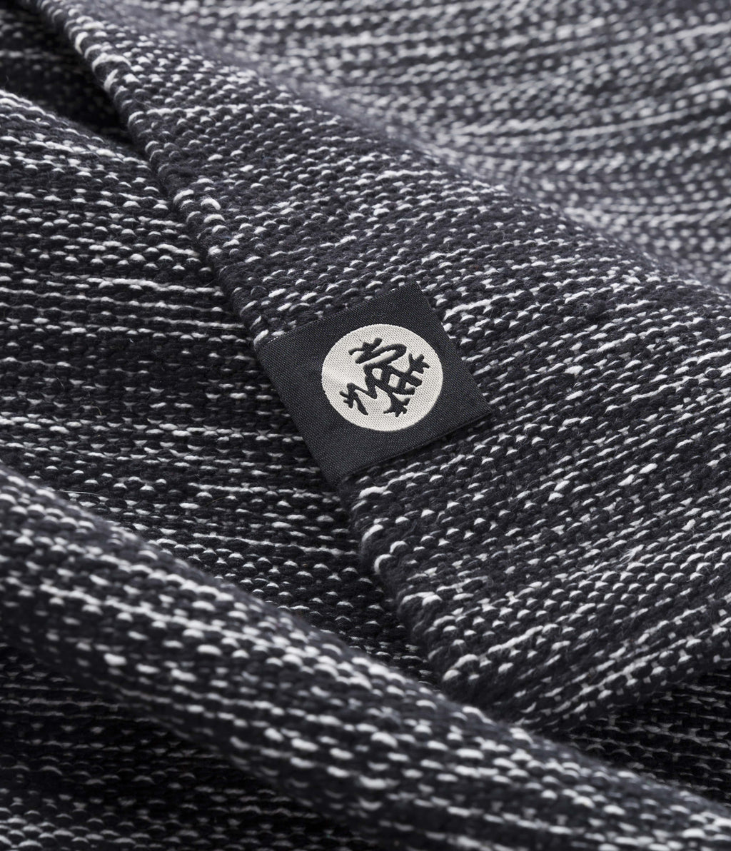 Manduka Shala Yoga Rug - Black Heather - close-up incl. logo | Manduka NZ