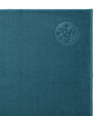 Manduka eQua Mat Towel - Sage - on top of a yoga mat | Manduka NZ