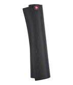 Manduka eKOLite 4mm Yoga Mat - Charcoal - rolled vertical | Manduka NZ