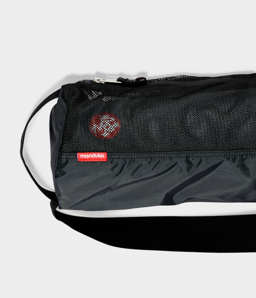 Manduka Breathe Easy Yoga Mat Bag - Black - Horizontal - top section with strap | Manduka NZ