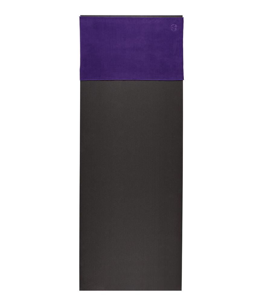 Manduka eQua Hand Towel - Magic - placed on a yoga mat | Manduka NZ