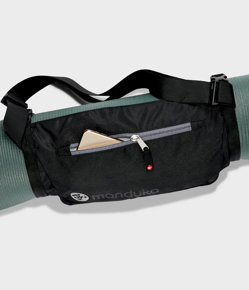 Manduka Go Play 3.0 Mat Carrier - Black - around mat with mobile phone in accesory pocket | Manduka NZ