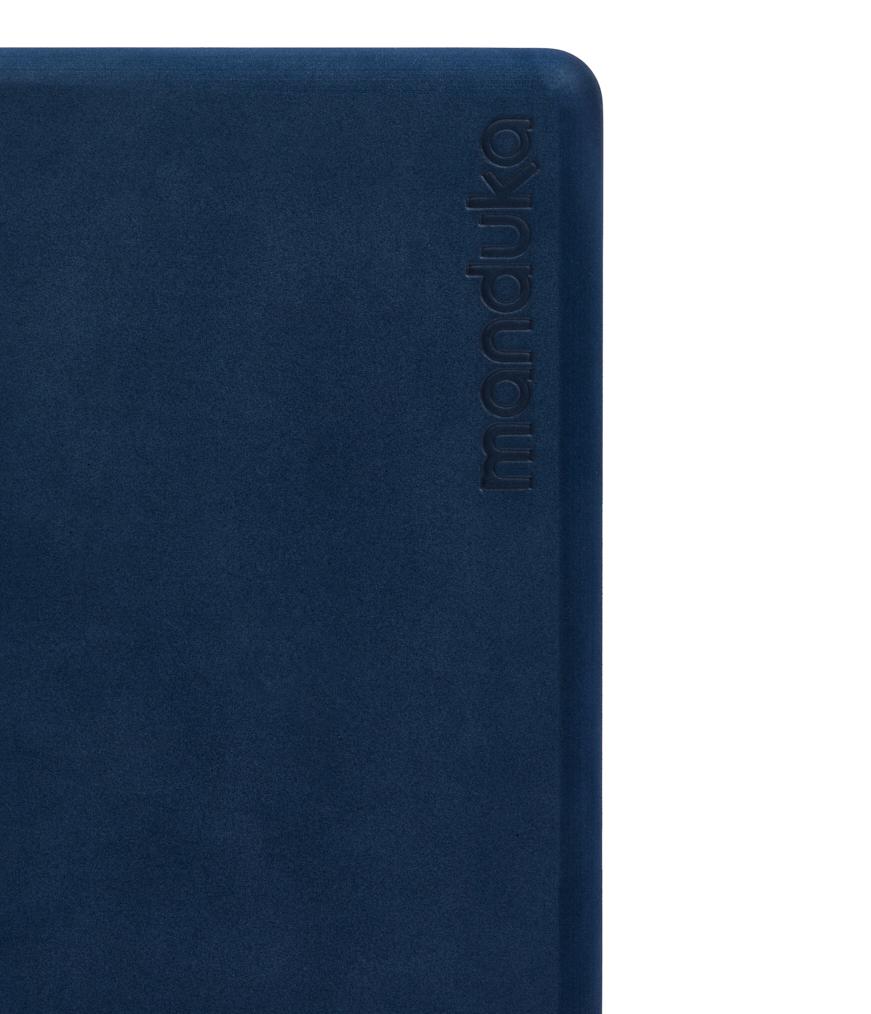 Manduka Recycled Foam Block - Midnight - corner view, with logo | Manduka NZ
