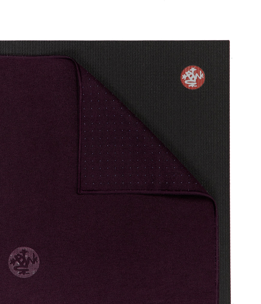 Manduka Yogitoes Hand Towel - Indulge - lying on top of a yoga mat | Manduka NZ