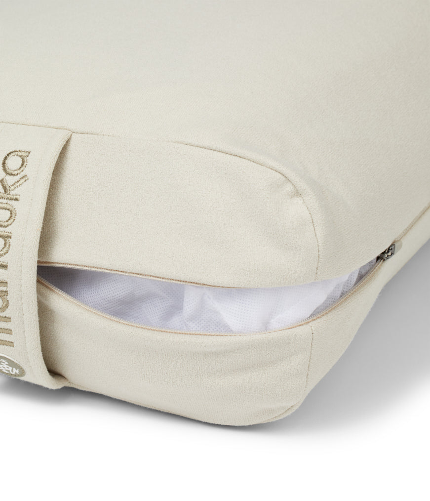 Manduka Enlight Rectangular Bolster - Sand - exposed filling | Manduka NZ