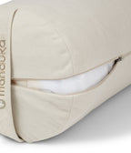 Manduka Enlight Round Bolster - Sand - exposed filling | Manduka NZ