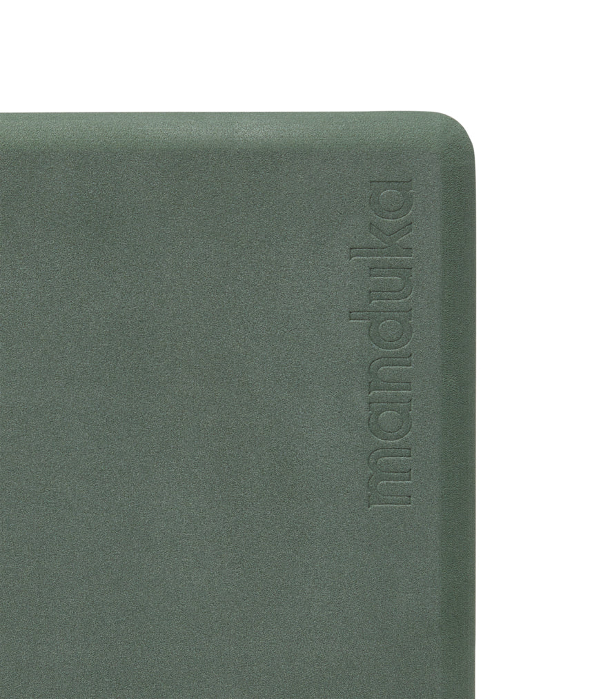 Manduka Recycled Foam Block - Sage - corner view, with logo | Manduka NZ