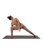 Dhara Capri Legging - Lions Mane Heather - model in asana on PRO Yoga Mat - Gallery Image 7 | Manduka | Manduka NZ