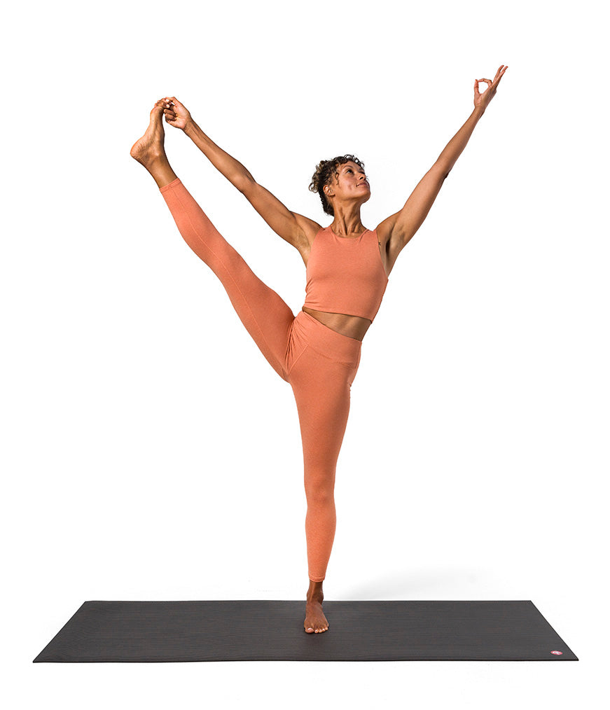 Dhara Legging - Clay Heather - model in asana on PRO Yoga Mat - Gallery Image 4 | Manduka | Manduka NZ