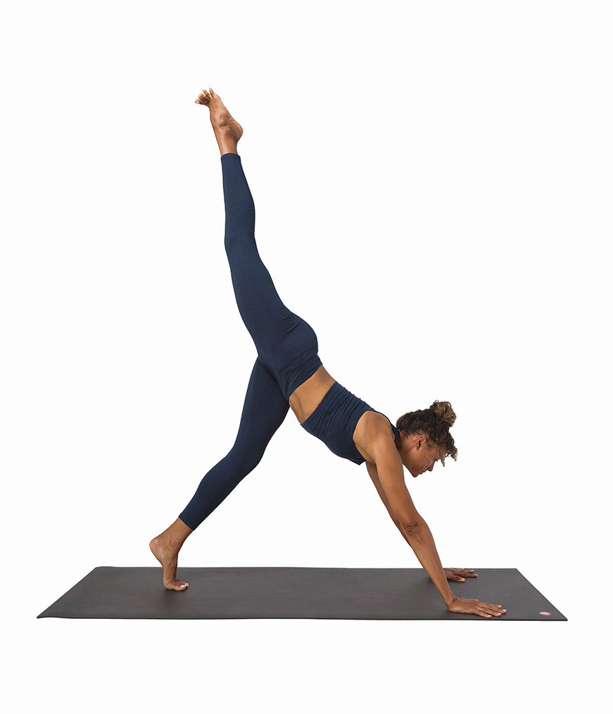 Dhara Legging - Midnight Heather - model in asana on PRO Yoga Mat - Gallery Image 6 | Manduka | Manduka NZ