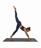 Dhara Legging - Midnight Heather - model in asana on PRO Yoga Mat - Gallery Image 6 | Manduka | Manduka NZ