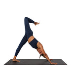 Dhara Legging - Midnight Heather - model in asana on PRO Yoga Mat - Gallery Image 7 | Manduka | Manduka NZ
