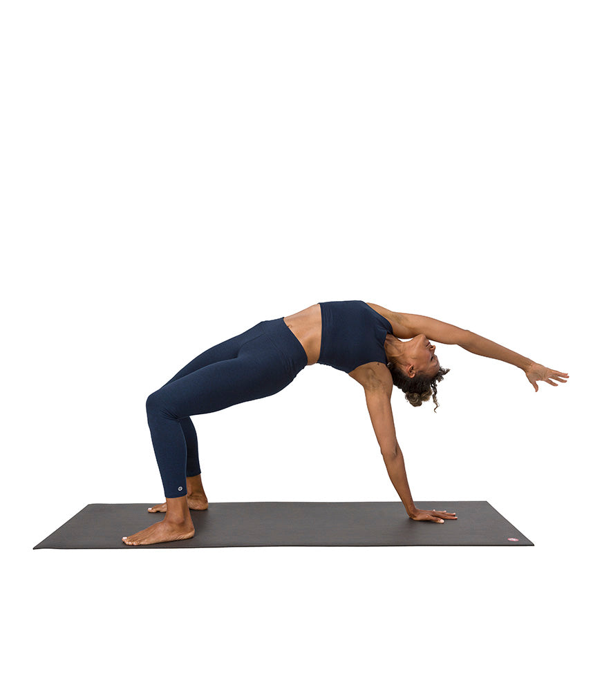 Dhara Legging - Midnight Heather - model in asana on PRO Yoga Mat - Gallery Image 8 | Manduka | Manduka NZ