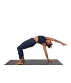 Dhara Legging - Midnight Heather - model in asana on PRO Yoga Mat - Gallery Image 8 | Manduka | Manduka NZ