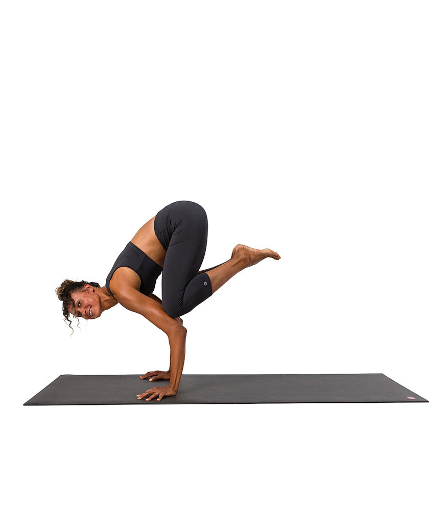Dhara Capri Legging - Phantom - model in asana on PRO Yoga Mat - Gallery Image 7 | Manduka | Manduka NZ