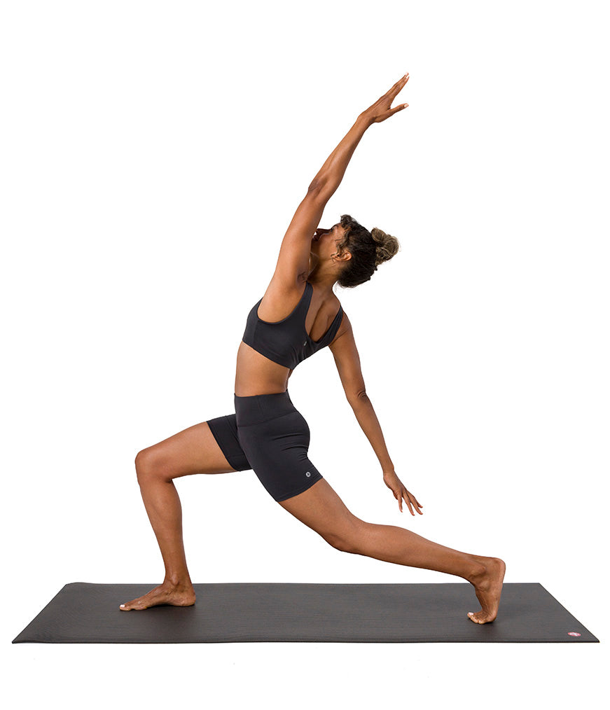Dhara Short - Phantom - model in asana on PRO Yoga Mat - Gallery Image 9 | Manduka | Manduka NZ