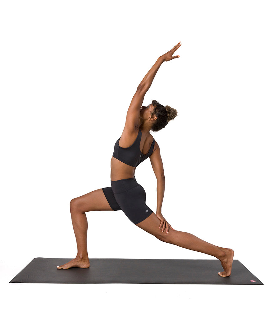Dhara Short - Phantom - model in asana on PRO Yoga Mat - Gallery Image 10 | Manduka | Manduka NZ