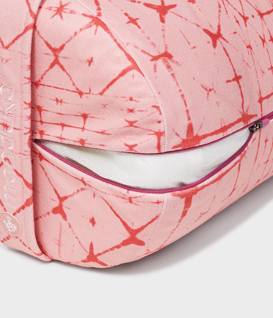 Manduka Enlight Round Bolster - Star Dye Coral - exposed filling | Manduka NZ