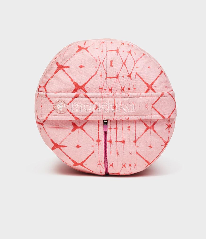 Manduka Enlight Round Bolster - Star Dye Coral - side on + handle | Manduka NZ