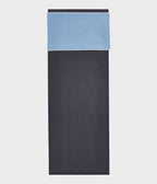 Manduka eQua Hand Towel - Clear Blue - placed on a yoga mat | Manduka NZ