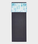 Manduka eQua Hand Towel - Spallter Splash Blue - placed on a yoga mat | Manduka NZ