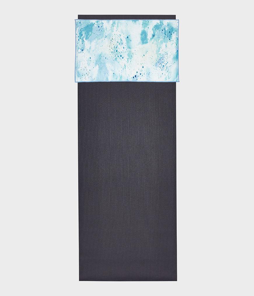Manduka eQua Hand Towel - Spallter Splash Blue - placed on a yoga mat | Manduka NZ