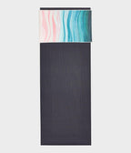 Manduka eQua Hand Towel - Ebb and Flow - placed on a yoga mat | Manduka NZ