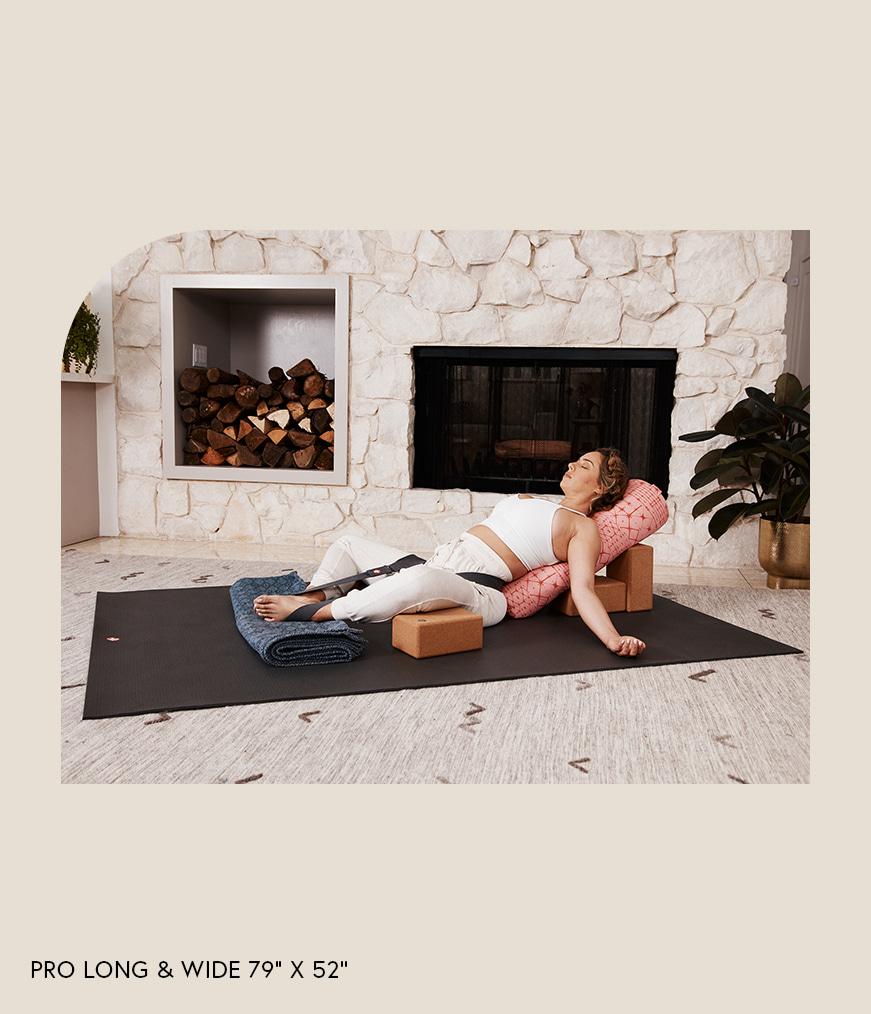 Manduka PRO 6mm Extra Large - Long & Wide - Black - yogi with blocks, bolsters, blanket on yoga mat in living room | Manduka NZ