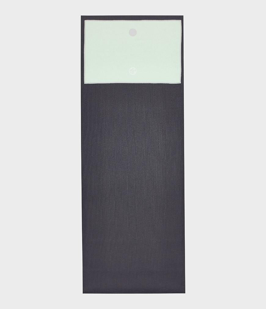 Manduka Yogitoes Hand Towel - Sea Foam - lying flat on top of a yoga mat | Manduka NZ