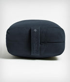 Manduka Enlight Rectangular Bolster - Midnight - end on + handle | Manduka NZ