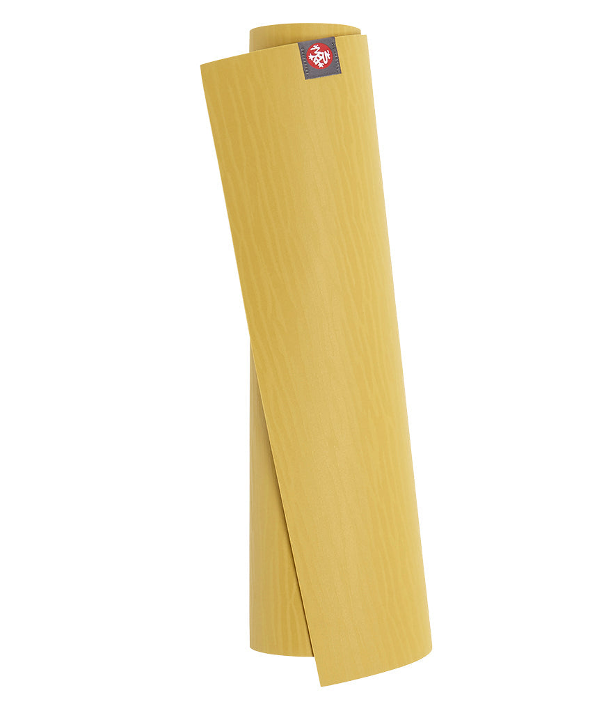 Manduka eKOLite 5mm Yoga Mat - Gold - rolled vertical | Manduka NZ