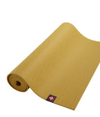 Manduka eKOLite 5mm Yoga Mat - Gold - part rolled | Manduka NZ