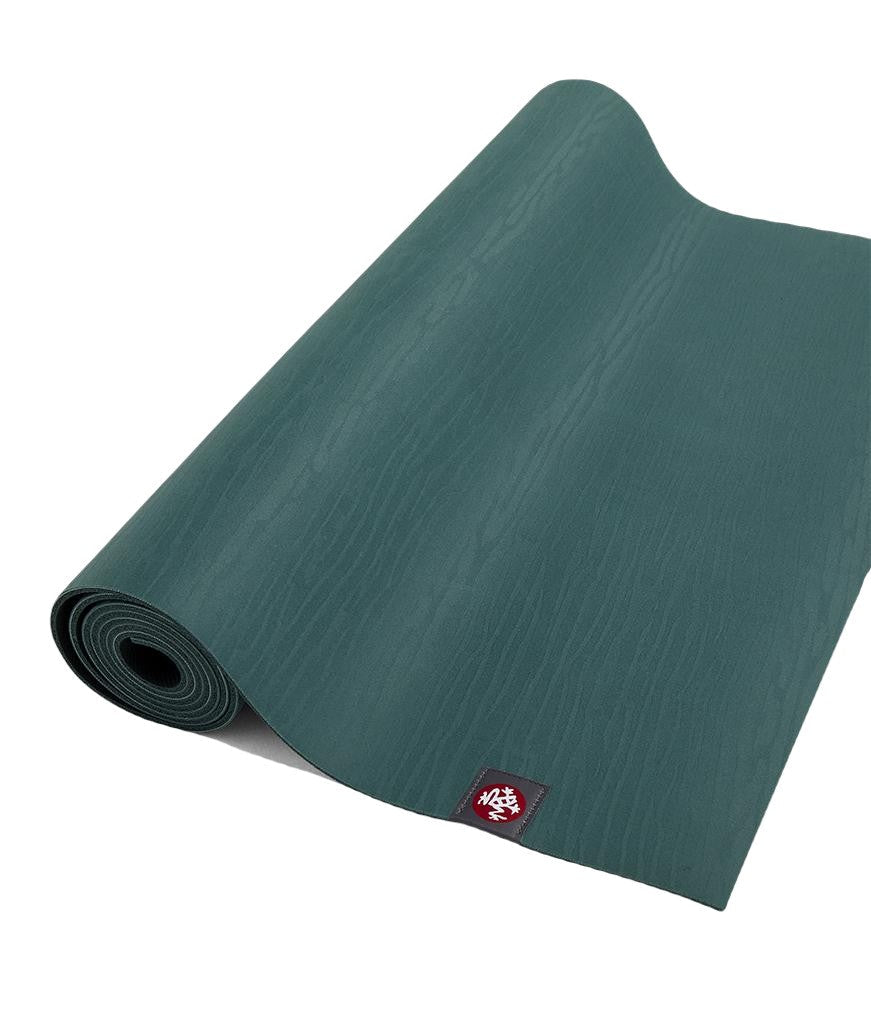 Manduka eKOLite 4mm Yoga Mat - Deep Sea - part rolled | Manduka NZ