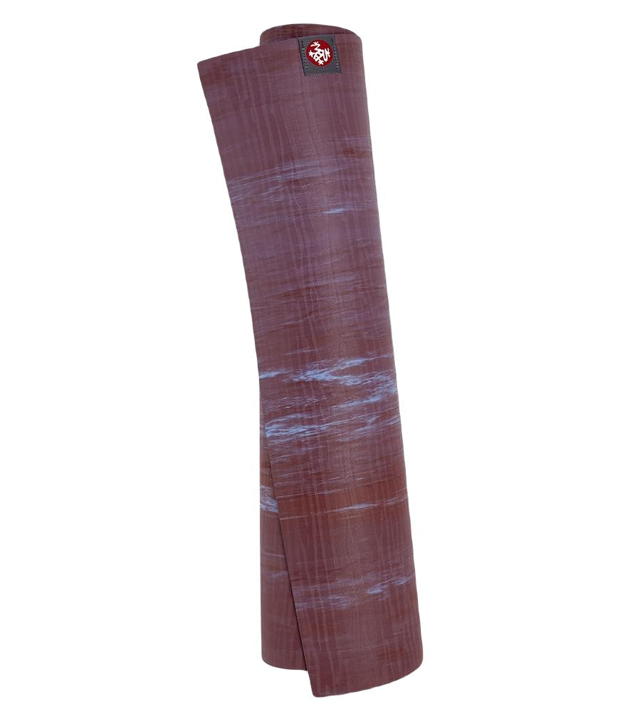 Manduka eKOLite 4mm Yoga Mat - Root Marbled - rolled vertical | Manduka NZ