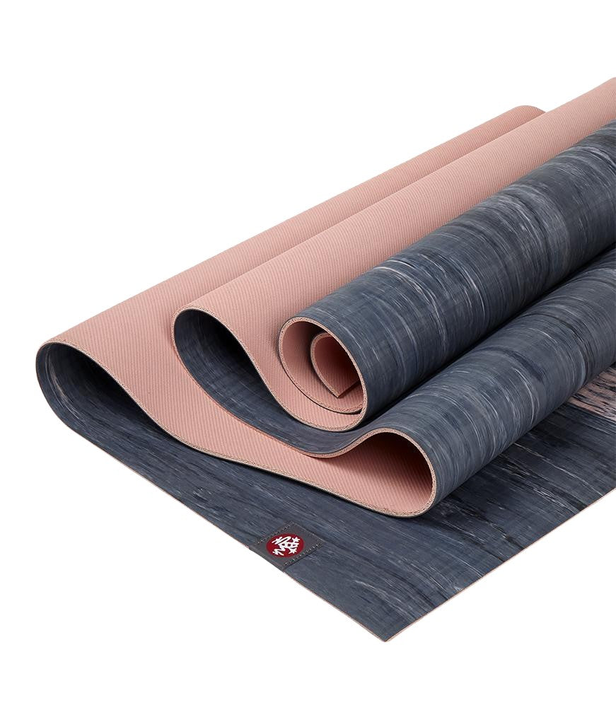 Manduka eKOLite 4mm Yoga Mat - Coral Marbled - folded | Manduka NZ