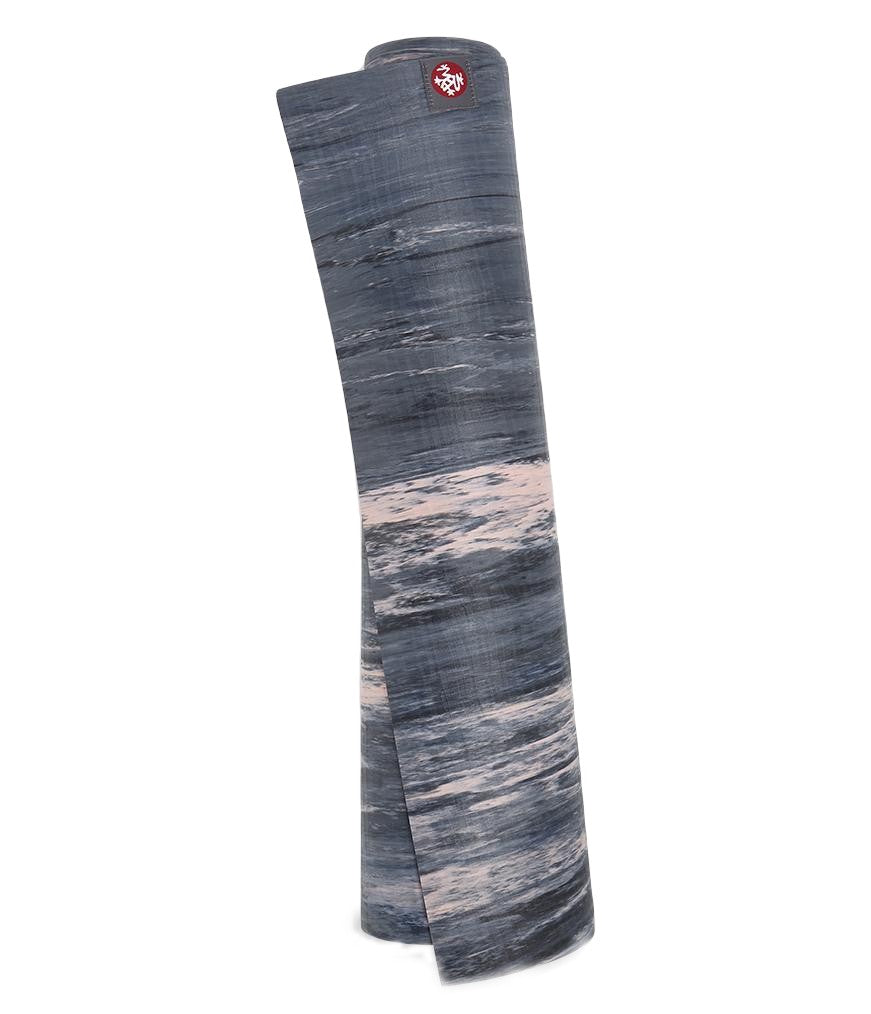 Manduka eKOLite 4mm Yoga Mat - Coral Marbled - rolled vertical | Manduka NZ