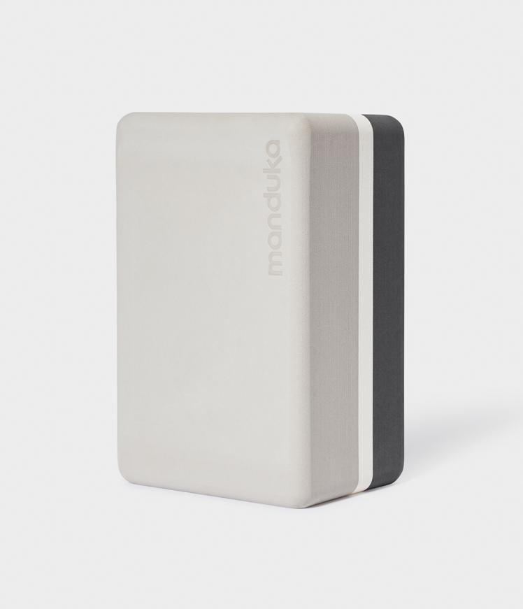Manduka Recycled Foam Block - Sand - standing vertically | Manduka NZ