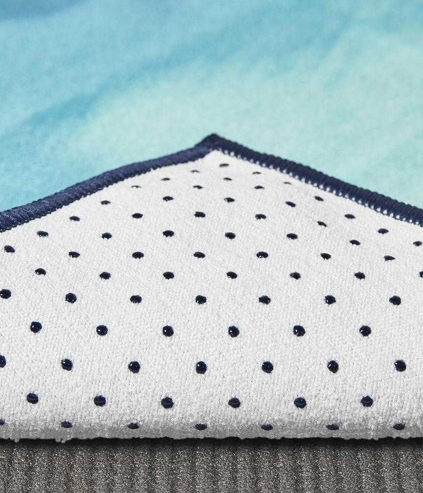 Manduka Yogitoes Mat Towel - Underwater Blur - corner folded over showing underside | Manduka NZ