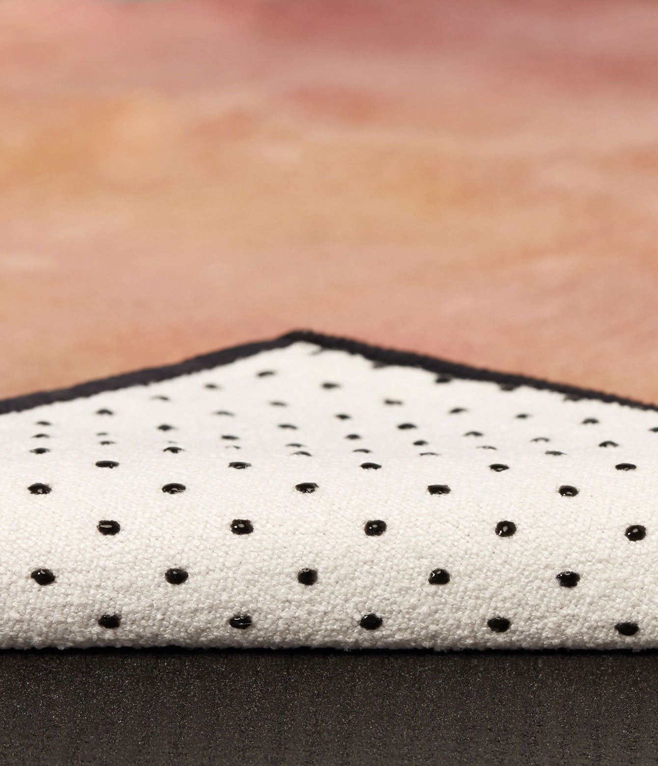 Manduka Yogitoes Mat Towel - Stained Glass - corner folded over showing underside | Manduka NZ