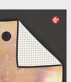 Manduka Yogitoes Mat Towel - Stained Glass - lying flat, corner folded over | Manduka NZ